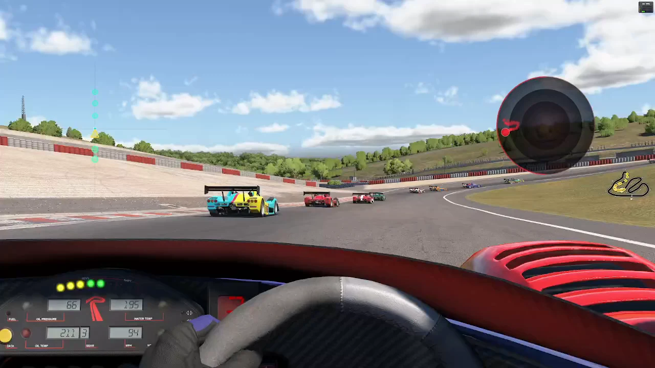 Lynx-Vector GripSense display under cornering load while following traffic in iRacing